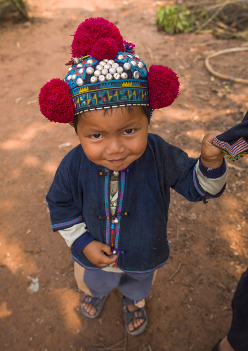 Yao minority kid with a traditional hat, Ban xay leck, Laos
