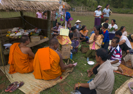 Family at death ceremony, Phonsavan, Laos