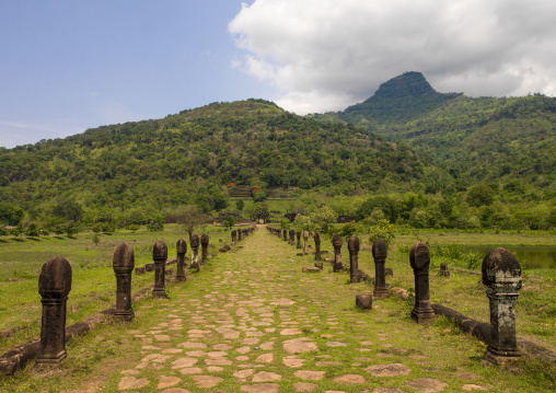 Raised stones lining lower level causeway leading to ancient khmer temple wat phu, Champasak, Laos