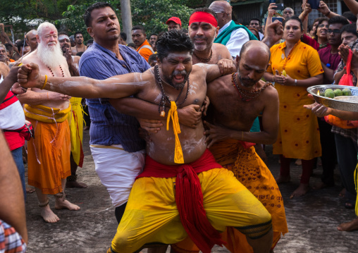 Devotee In Trance At Thaipusam Hindu Festival At Batu Caves Before Being Pierced, Southeast Asia, Kuala Lumpur, Malaysia