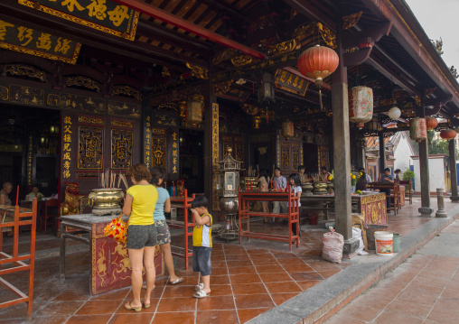 People Praying In Cheng Hoon Teng Temple, Malacca, Malaysia