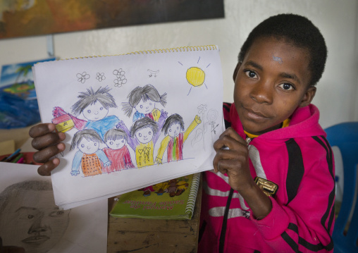 Boy Showing A Drawing In A School, Inhambane, Inhambane Province, Mozambique