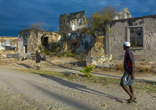 Men Passing In Front Of Some Old Portuguese Colonial Building, Ibo Island, Cabo Delgado Province, Mozambique