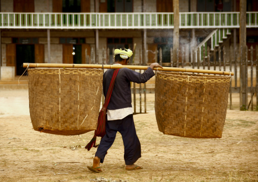 Man From Taunggyi Carrying Heavy Bag, Myanmar
