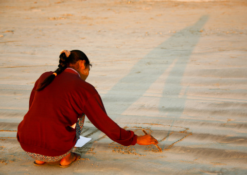 Student Doing School Execices On Sand, Ngapali, Myanmar