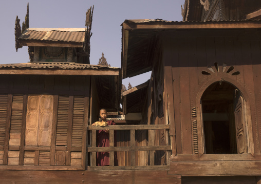 Novice Buddhist With A Cat In Shwe Yan Pyay Monastery, Inle Lake, Myanmar