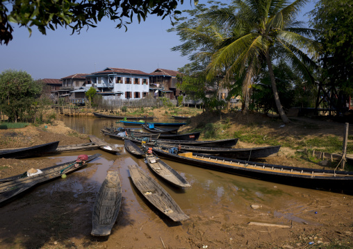 Boats On Banks In Front Of A Huge House, Inle Lake, Myanmar