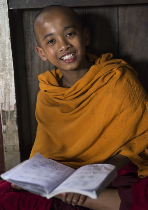 Young Novice Reading A Book, Mrauk U, Myanmar