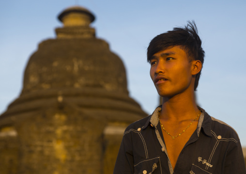 Brumese Man In Front Of A Buddhist Temple, Mrauk U, Myanmar