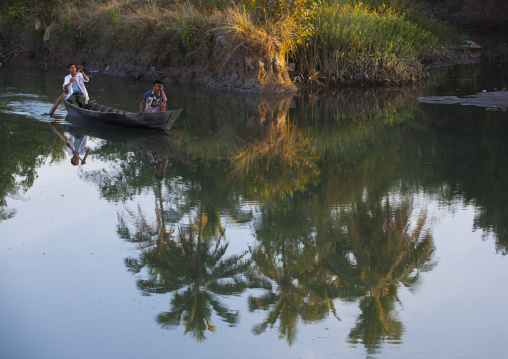 Men In A Boat On A River, Mrauk U, Myanmar