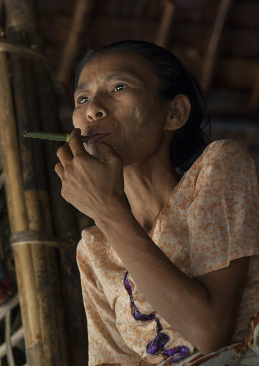 Burmese Woman Smoking A Cigar, Mrauk U, Myanmar