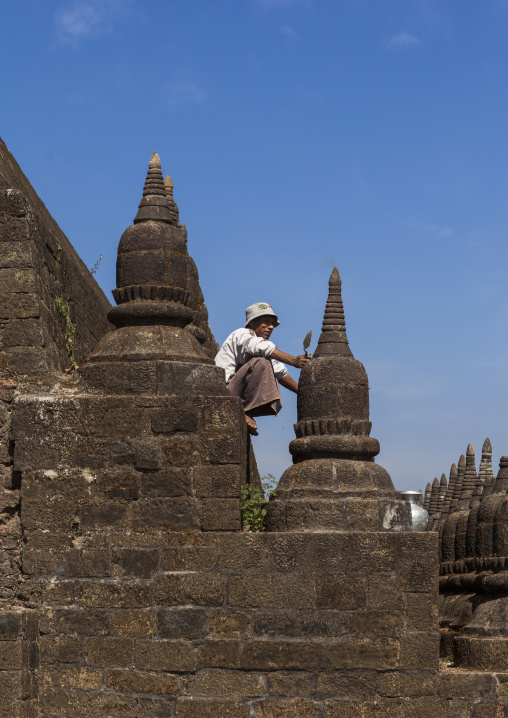 Man Restoring Kothaung Stupas, Mrauk U, Myanmar