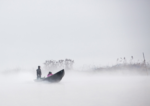 Tourists In The Fog On A Boat Tour, Inle Lake, Myanmar