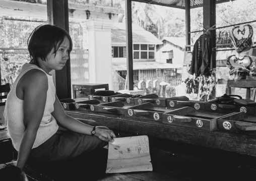 Girl Taking Care Of Temple Restooms In Yangon, Myanmar