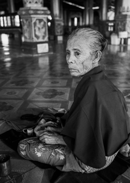 Old Burmese Woman In A Temple, Yangon, Myanmar