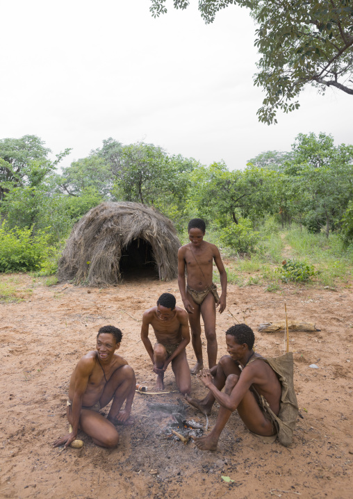 Bushman People Around A Fire In A Traditional Village, Tsumkwe, Namibia