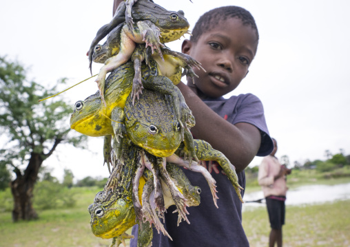 Young Boy Selling Frogs, Ongula, Namibia