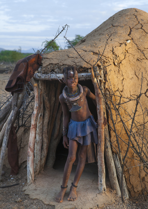 Girl Of Himba Tribe Standing In Door Of Shack, Epupa, Namibia