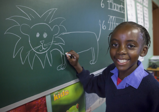Girl Drawing A Lion In Africat Foundation School, Okonjima, Namibia
