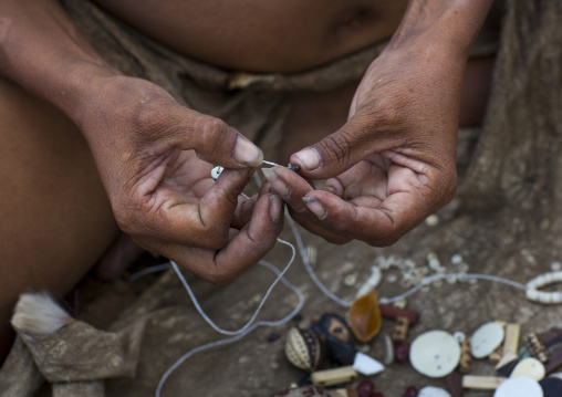 Bushman Women Making Necklaces With Ostrich Egg Shell, Tsumkwe, Namibia