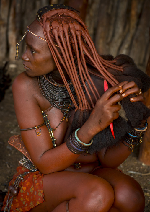 Himba Woman Taking Care Of Her Hair, Epupa, Namibia