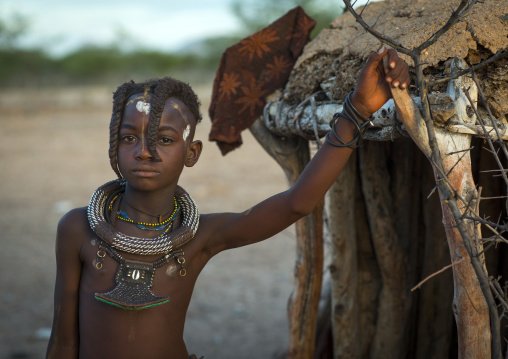 Girl Of Hima Tribe Standing In Door Of Shack, Epupa, Namibia