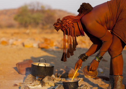 Himba Woman Cooking, Epupa, Namibia