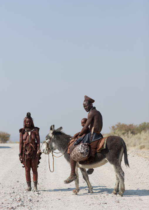 Himba Family With A Donkey, Namibia