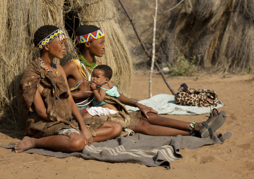 San Woman Breast Feeding Her Baby, Namibia