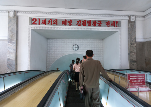 North Korean people using escalator leading to the subway station, Pyongan Province, Pyongyang, North Korea