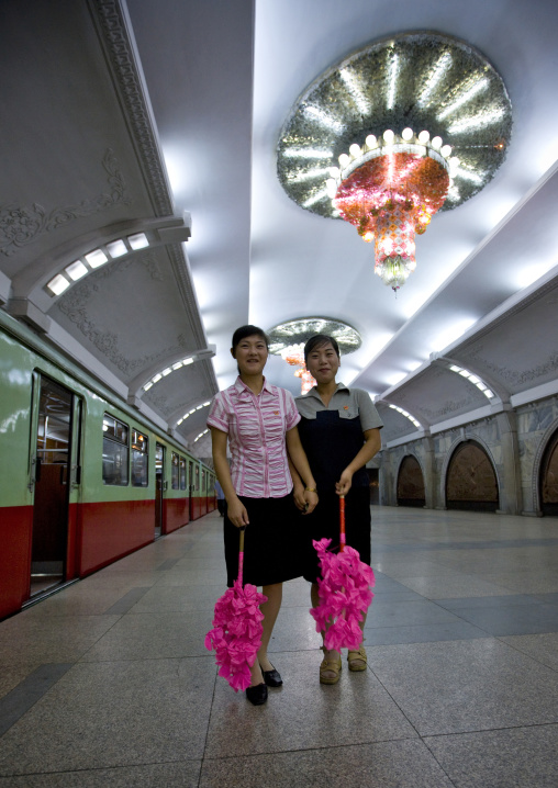 North Korean women with plastic flowers for a parade in puhung station on Chollima line, Pyongan Province, Pyongyang, North Korea