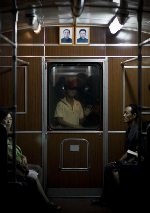 Official portraits of the Dear Leaders in a subway wagon, Pyongan Province, Pyongyang, North Korea