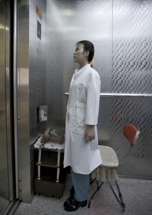 North Korean doctor in an elevator in a maternity, Pyongan Province, Pyongyang, North Korea