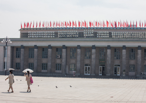 North Korean women crossing Kim ii-sung square, Pyongan Province, Pyongyang, North Korea