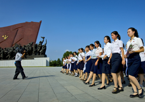 North Korean women going to pay respect to the statues of the Dear Leaders in Mansudae Grand monument, Pyongan Province, Pyongyang, North Korea