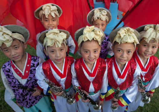 Pungmul children artists during the celebration of the 60th anniversary of the regim, Pyongan Province, Pyongyang, North Korea