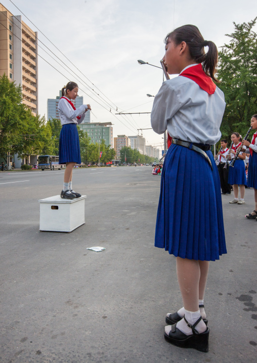 North Korean pioneers playing music during the celebration of the 60th anniversary of the regim, Pyongan Province, Pyongyang, North Korea