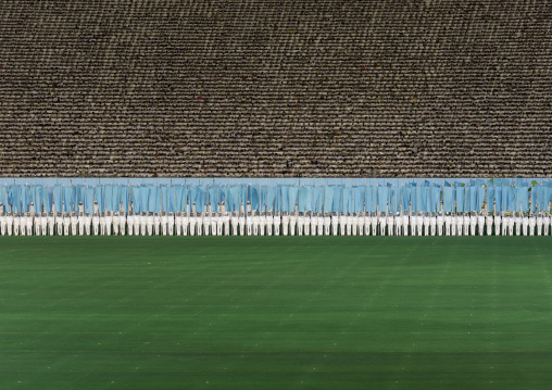 Children used to make human pixels by holding up colored boards during Arirang mass games in may day stadium, Pyongan Province, Pyongyang, North Korea