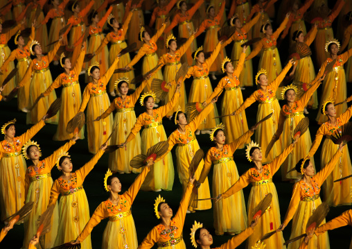 North Korean women dancing in choson-ot during the Arirang mass games in may day stadium, Pyongan Province, Pyongyang, North Korea