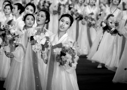 North Korean women dancing in choson-ot during the Arirang mass games in may day stadium, Pyongan Province, Pyongyang, North Korea