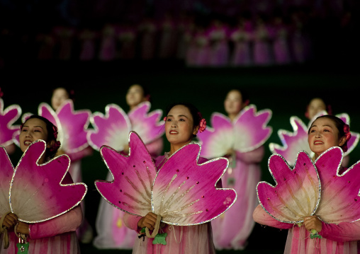 North Korean women dancing in choson-ot during the Arirang mass games in may day stadium, Pyongan Province, Pyongyang, North Korea