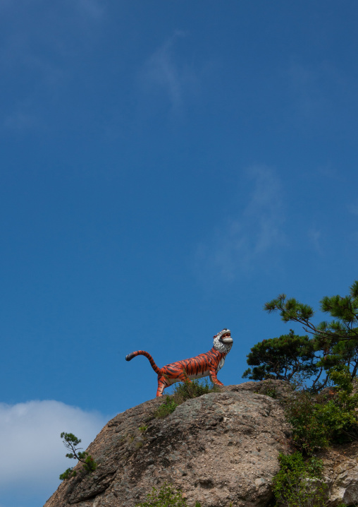 Statue of tiger on a rock in Moran park, Pyongan Province, Pyongyang, North Korea