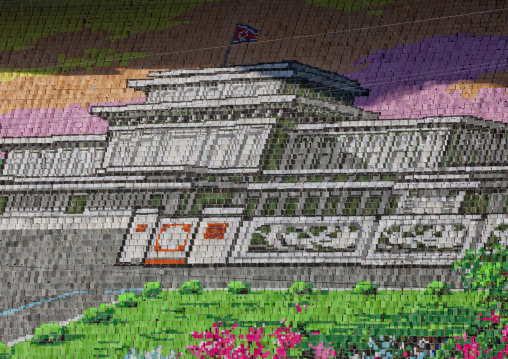Kumsusan memorial palace made by children pixels holding up colored boards during Arirang mass games in may day stadium, Pyongan Province, Pyongyang, North Korea