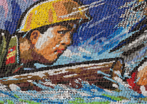 North Korean soldier made by children pixels holding up colored boards during Arirang mass games in may day stadium, Pyongan Province, Pyongyang, North Korea