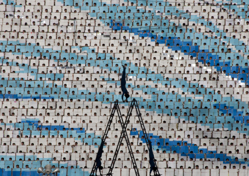 North Korean gymnasts in front of a human fresco during the Arirang mass games in may day stadium, Pyongan Province, Pyongyang, North Korea