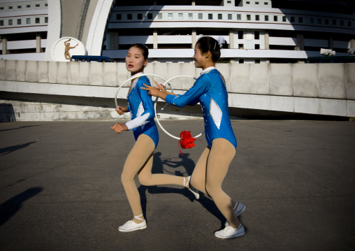 North Korean gymnasts going to the Arirang mass games outside of may day stadium, Pyongan Province, Pyongyang, North Korea