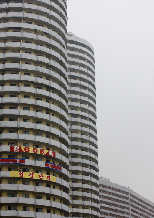 Propaganda slogan on old apartements in the city center, Pyongan Province, Pyongyang, North Korea