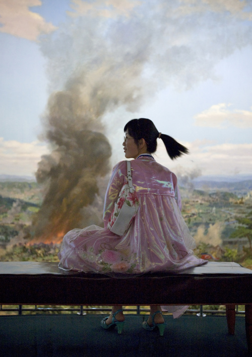 North Korean visitor lookingthe battle of taejon diorama in the victorious fatherland liberation war museum, Pyongan Province, Pyongyang, North Korea