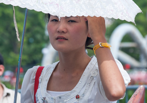 Portrait of a North Korean woman under an umbrela, Pyongan Province, Pyongyang, North Korea