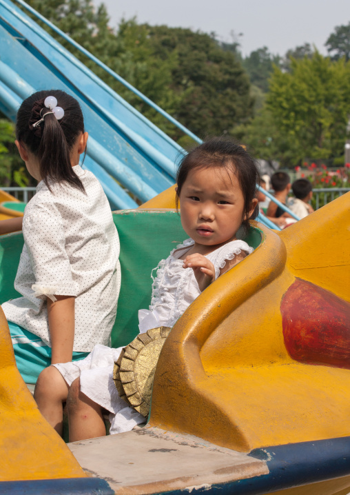 North Korean girls in an attraction in Taesongsan funfair, Pyongan Province, Pyongyang, North Korea
